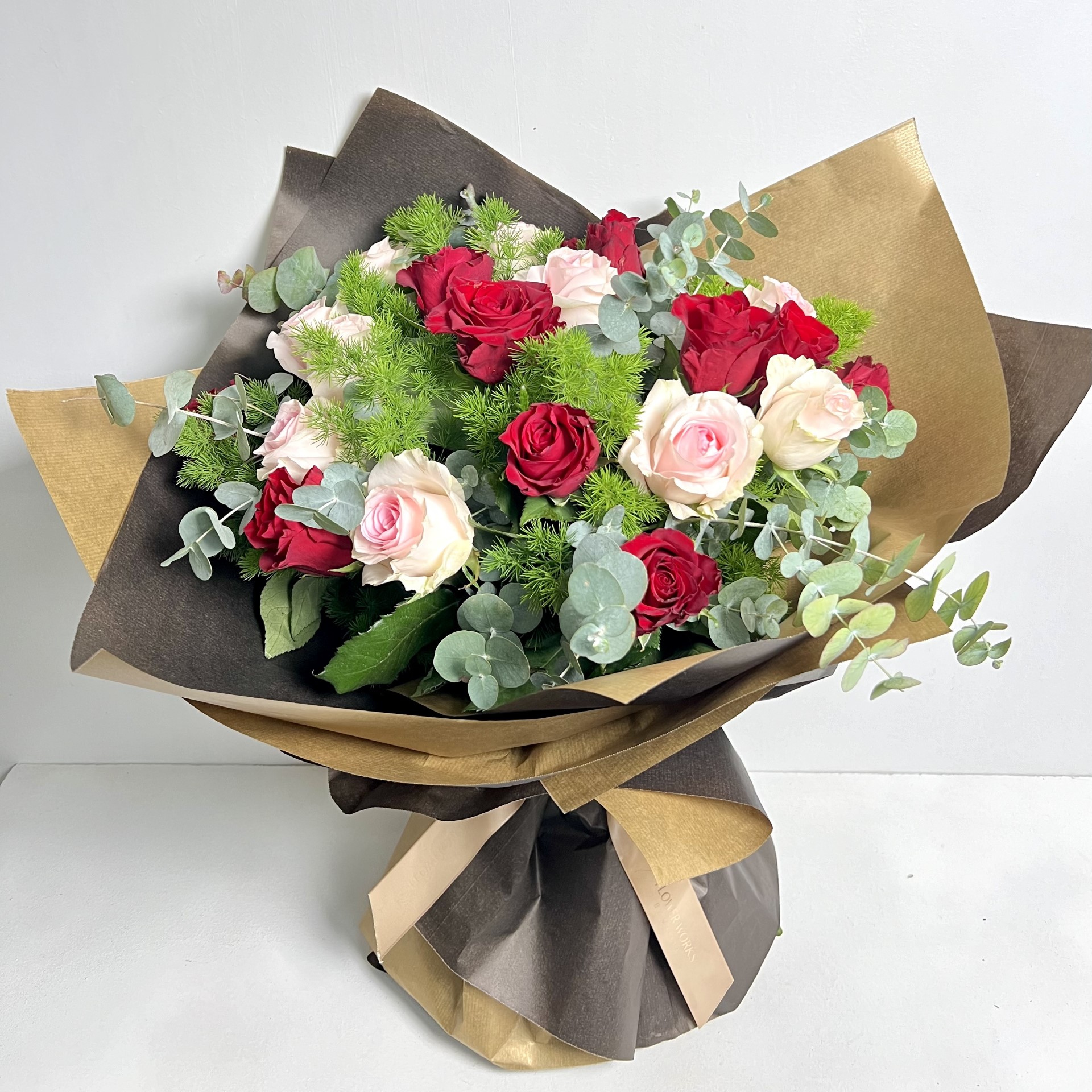 21 PINK AND RED ROSES BOUQUET AND GREENERY