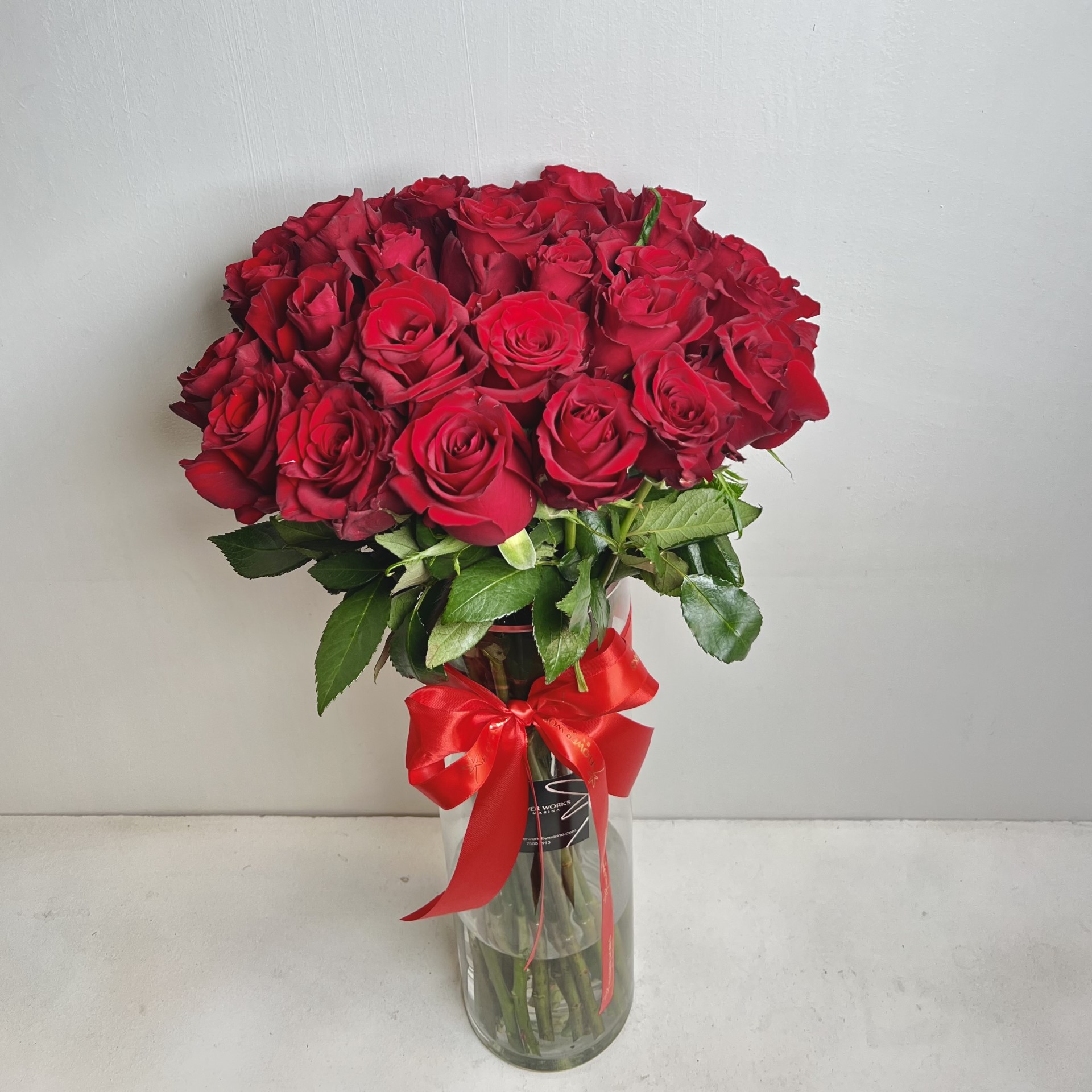 RED ROSES IN A VASE